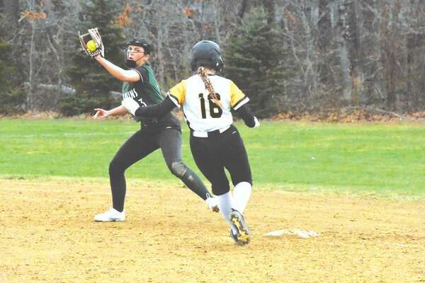 Junior Cammie Rose beats a throw to make it to second base safely.