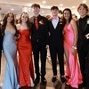Monomoy Regional High School held its prom last Thursday at the Pelham House Resort in Dennis. Although the rain precluded the traditional Grand March, students managed to provide parents and friends with photo ops prior to the main event. Above, from left, David Joy, Tatiana Malone, Shane Whitman, Mia Salmon, Devlin Towers, Suzanne Brown, Shane Yarletts, and Karlie Monteiro gather for a photo before the big evening.  KIM RODERIQUES PHOTOS
