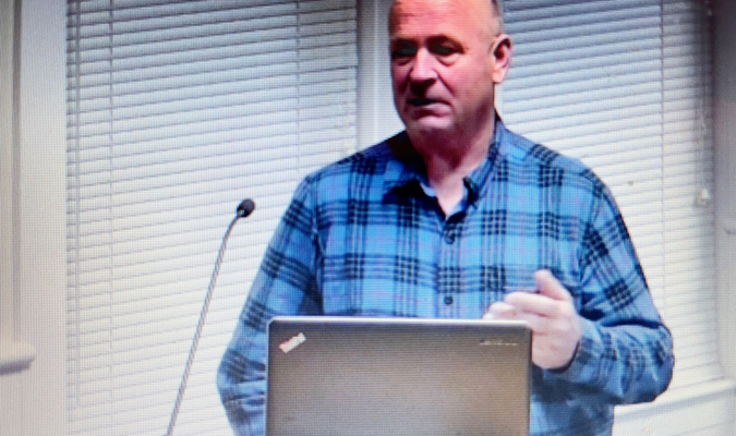 Tom Smith, an Orleans resident and fisherman, addresses the finance committee about the proposed $8.3 million Rock Harbor bulkhead project March 21.  RYAN BRAY PHOTO