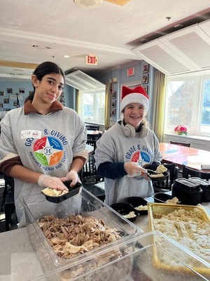 Monomoy Regional High School students volunteer at Family Table Collaborative as part of Grade 8 Giving.