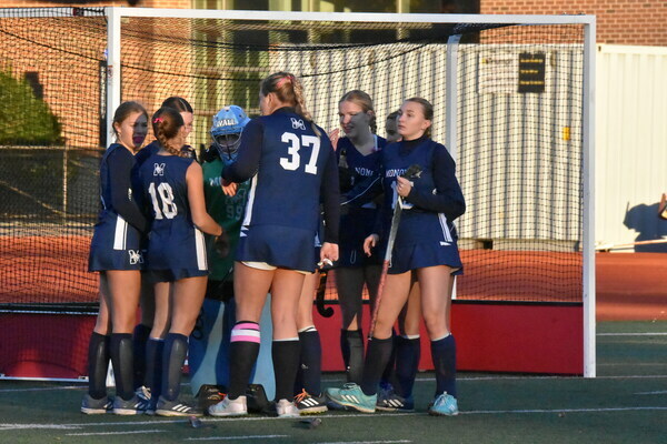 The Monomoy field hockey team came together for one final team gathering after falling to Uxbridge, 4-0, in the Division 4 state final at Worcester Polytechnic Institute.