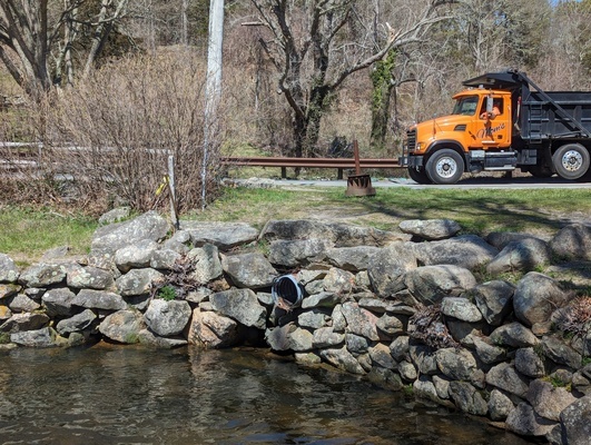 On the south side of the road, the contractor will rebuild a portion of the stone wall on the edge of the main pool, where a stormwater drain has begun to fail. Here, crews will likely install low concrete footing to stabilize the bank, with stones on top.